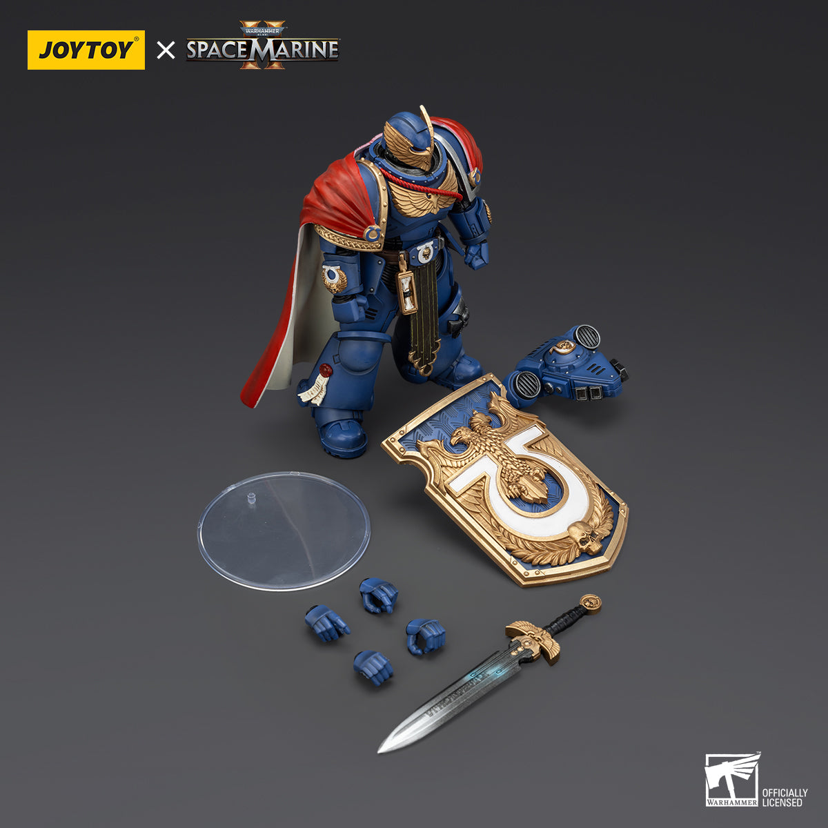 Contents of Ultramarines Victrix Honour Guard package, including the action figure, interchangeable parts, weapons, and accessories, neatly packed for display or customization.
