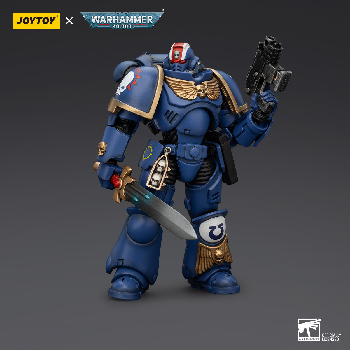 Ultramarines Primaris Lieutenant Erastus, viewed from the front. The model stands tall with an authoritative presence, clad in the distinctive blue and gold armor of the Ultramarines.