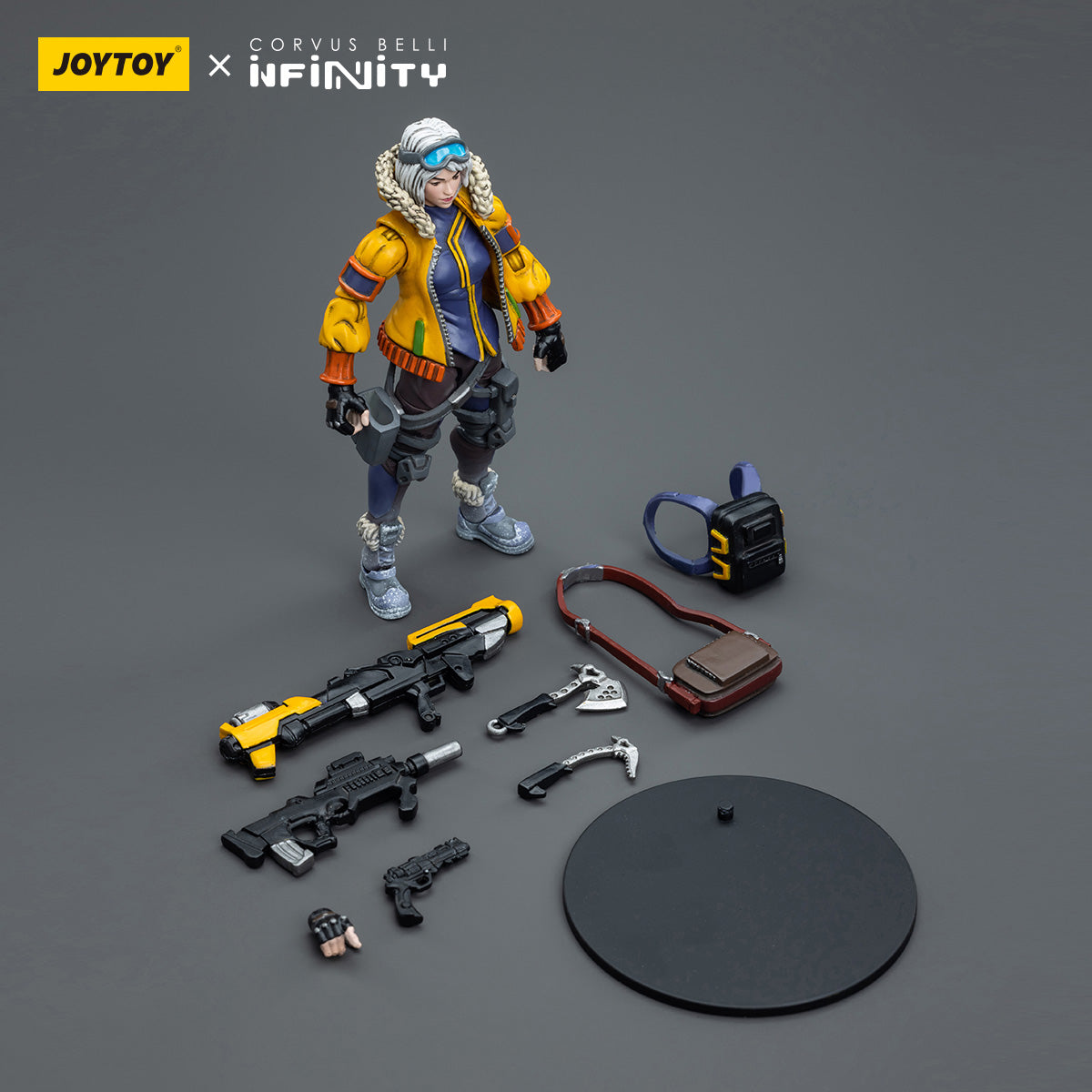 Package contents for Oktavia Grimsdottir, Icebreaker's Harpooner, including the detailed miniature of the harpoon-wielding warrior. The set comes with interchangeable parts, such as different arm options for varied poses, and a detailed harpoon weapon.