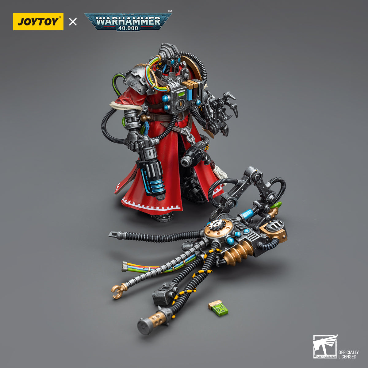 Package contents for the Cybernetica Datasmith. The set includes a highly detailed figure of the Datasmith, equipped with a servo-skull and a cybernetic arm.