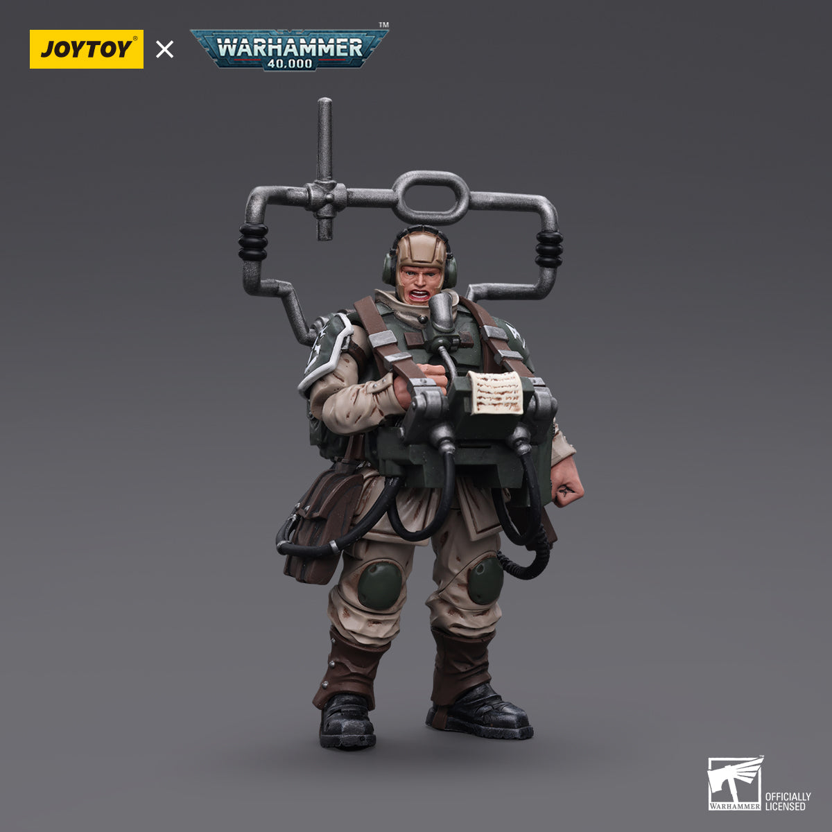 Side view of the Cadian Command Squad Veteran with Master Vox. The veteran’s armored silhouette is framed by the massive vox-caster, which is equipped with antennae and signal relays.
