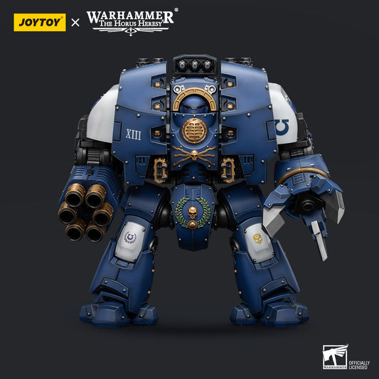 Ultramarines Leviathan Dreadnought with Cyclonic Melta Lance and Siege Claws, viewed from the front. The Dreadnought is heavily armored, with its iconic Ultramarine blue paint scheme and gold trim.