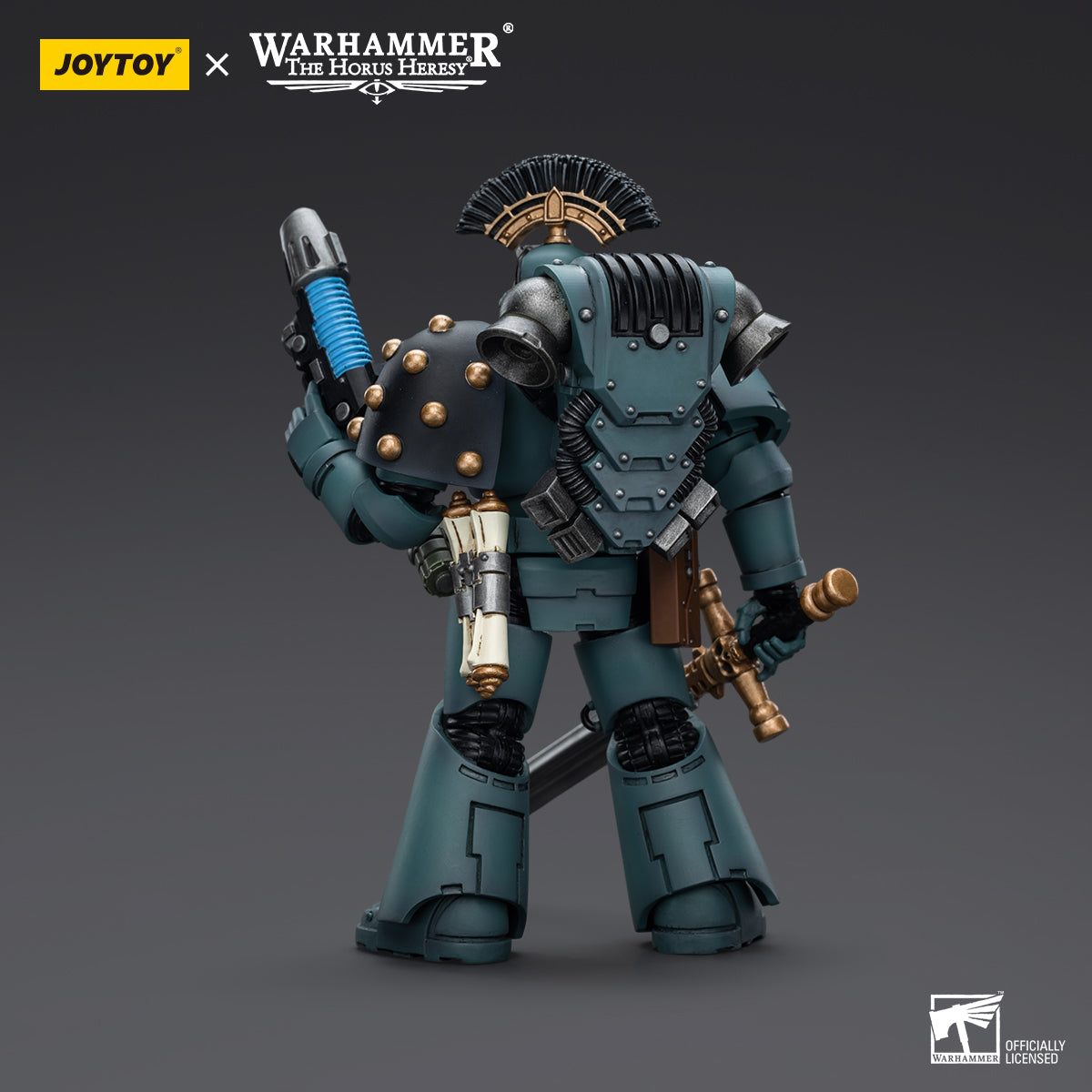 Back view of Sons of Horus MKVI Tactical Squad Sergeant with Power Sword, showcasing the rear armor, power pack, and weapon placement on the figure.