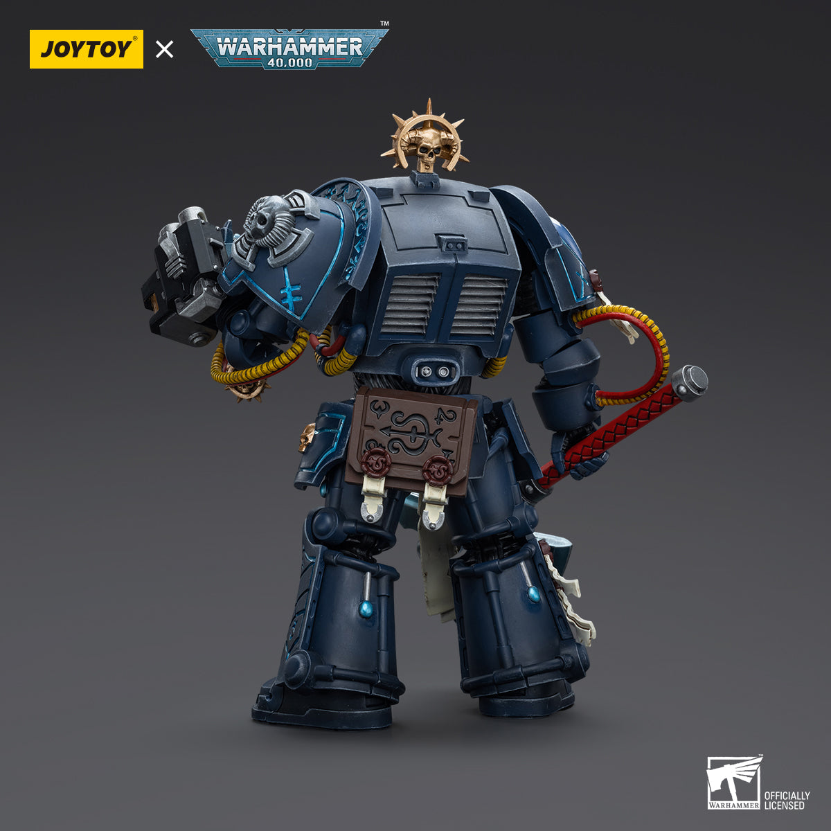 Back view of Ultramarines Librarian in Terminator Armor, highlighting the power pack, psychic hood, and rear armor detailing.